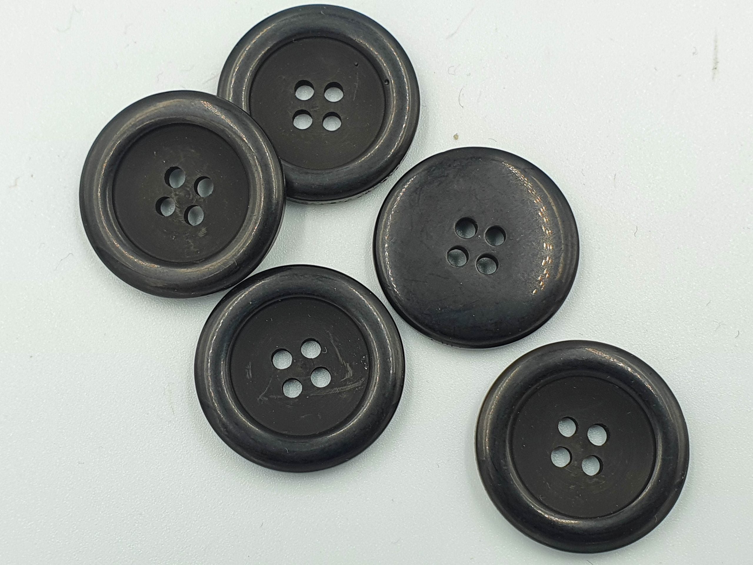 Nasturi rotunzi, negri, prindere cu 4 gauri, marime 25mm - 25mm/40 Lin