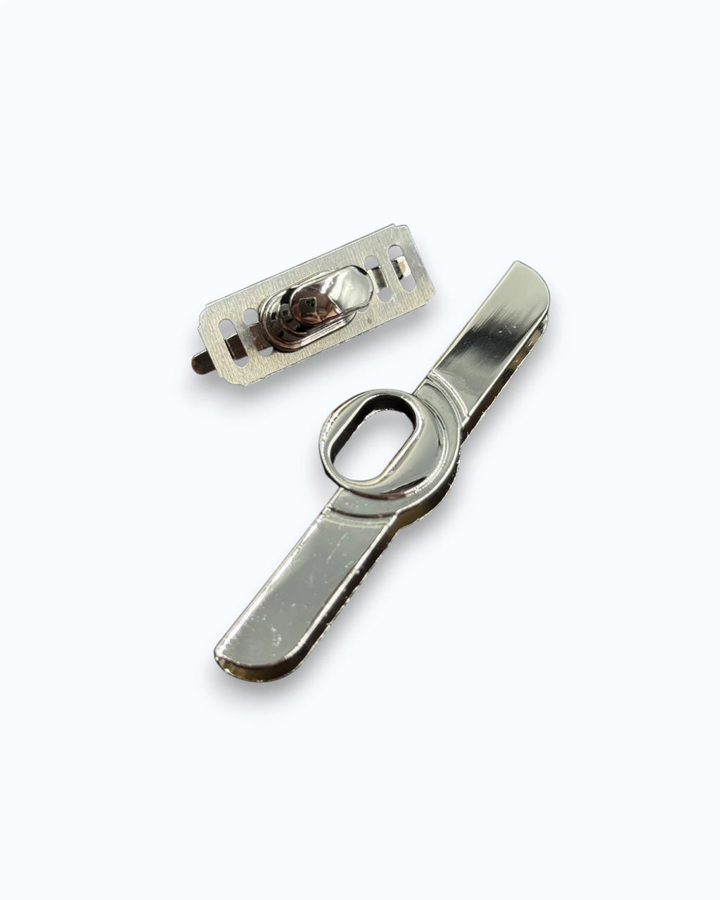 Inchizatoare metalica cu sistem rotativ pentru genti Argintie