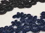 Broderie negru si bleumarin pe suport de tul